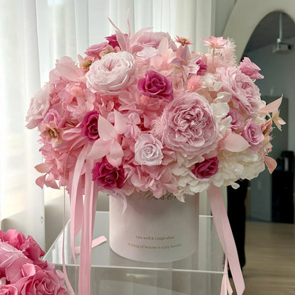 LULU ROSÉE Detailed View of Blush Hydrangea Rose Garden Bucket, Mixed Pink Preserved Roses and Hydrangeas