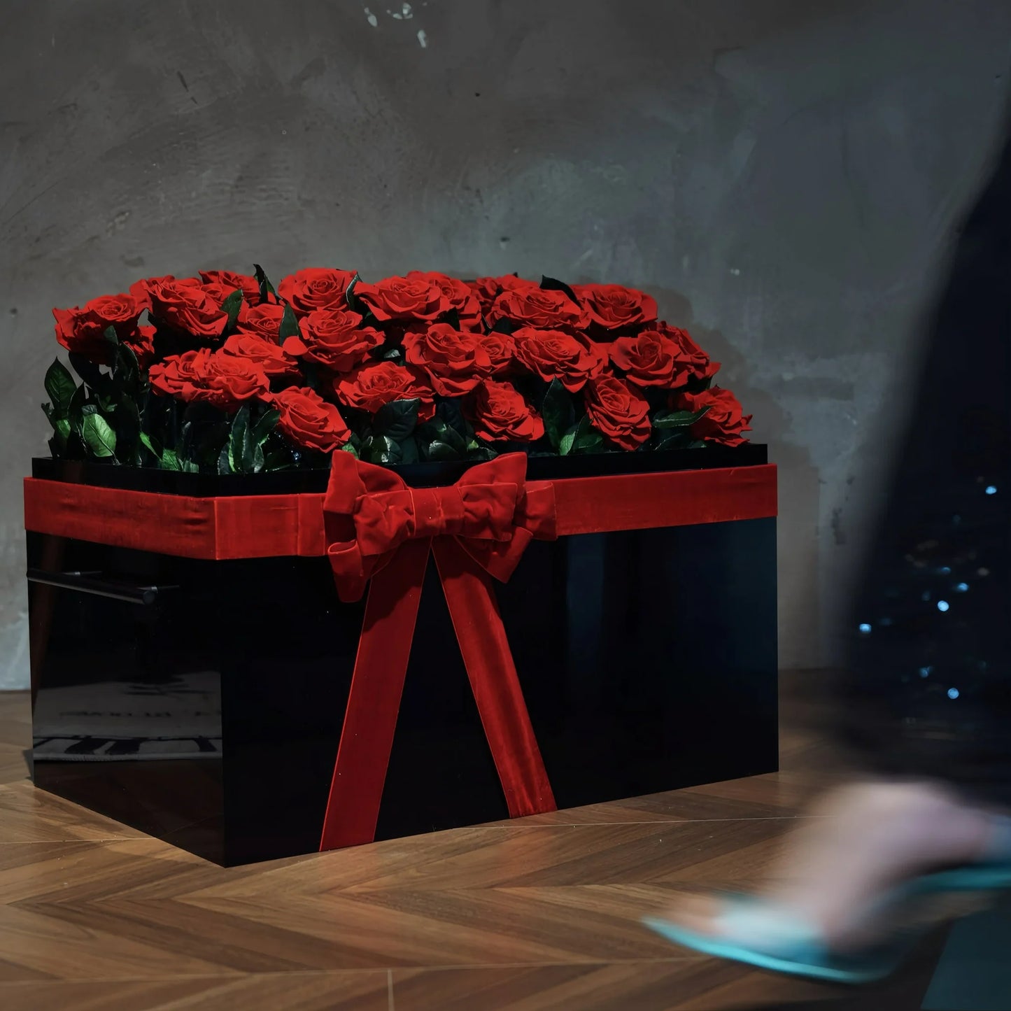 LULU ROSÉE Eternal Rose Garden 52 Red Roses in Black Box with Red Ribbon, Lifestyle Shot with Model