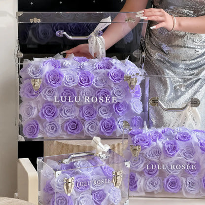 LULU ROSÉE Grande Eternal Acrylic Handbag Rose Box, luxury handbag-shaped transparent acrylic gift box filled with lavender purple preserved roses, customizable flower colors, romantic everlasting floral souvenir for anniversary & birthday gifting
