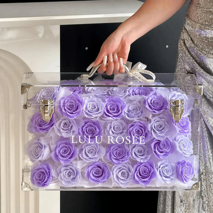 LULU ROSÉE Grande Eternal Acrylic Handbag Rose Box, luxury handbag-shaped transparent acrylic gift box filled with solid light purple preserved roses, customizable flower colors, romantic everlasting floral souvenir for anniversary & birthday gifting