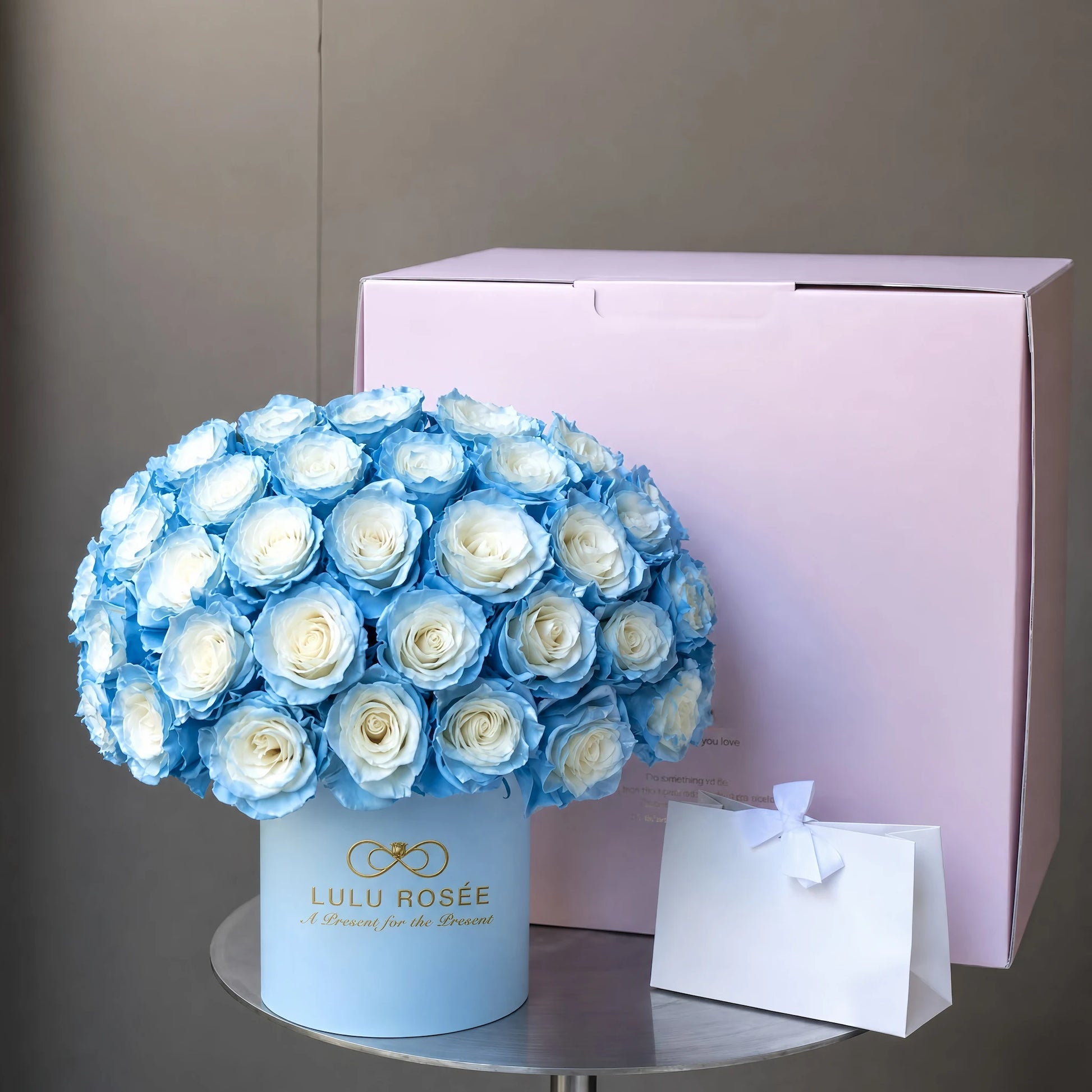 LULU ROSÉE Grande Superdome Ice Blue Gradient Preserved Rose Box with matching pink outer gift box and white gift card, complete luxury everlasting rose gifting set for anniversaries and birthdays