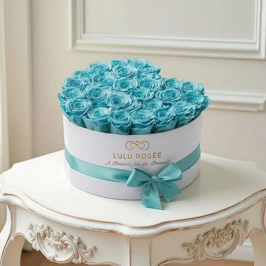 LULU ROSÉE large heart box tiffany blue white classic on a decorative table