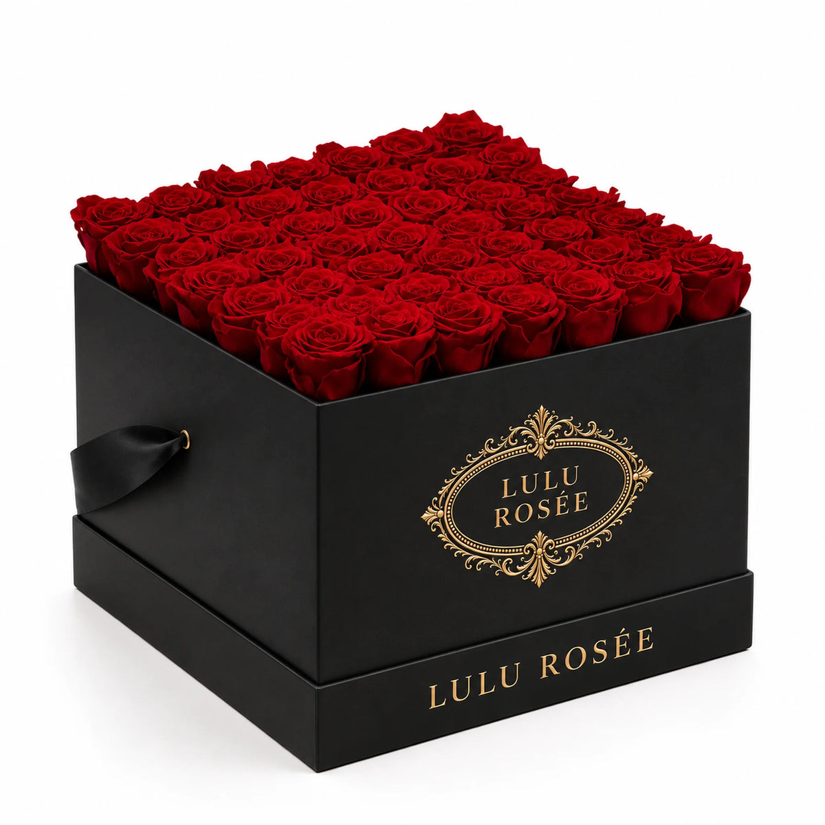 Red preserved roses fill a black classic LULU ROSÉE large square box, photographed from the front against a white background.