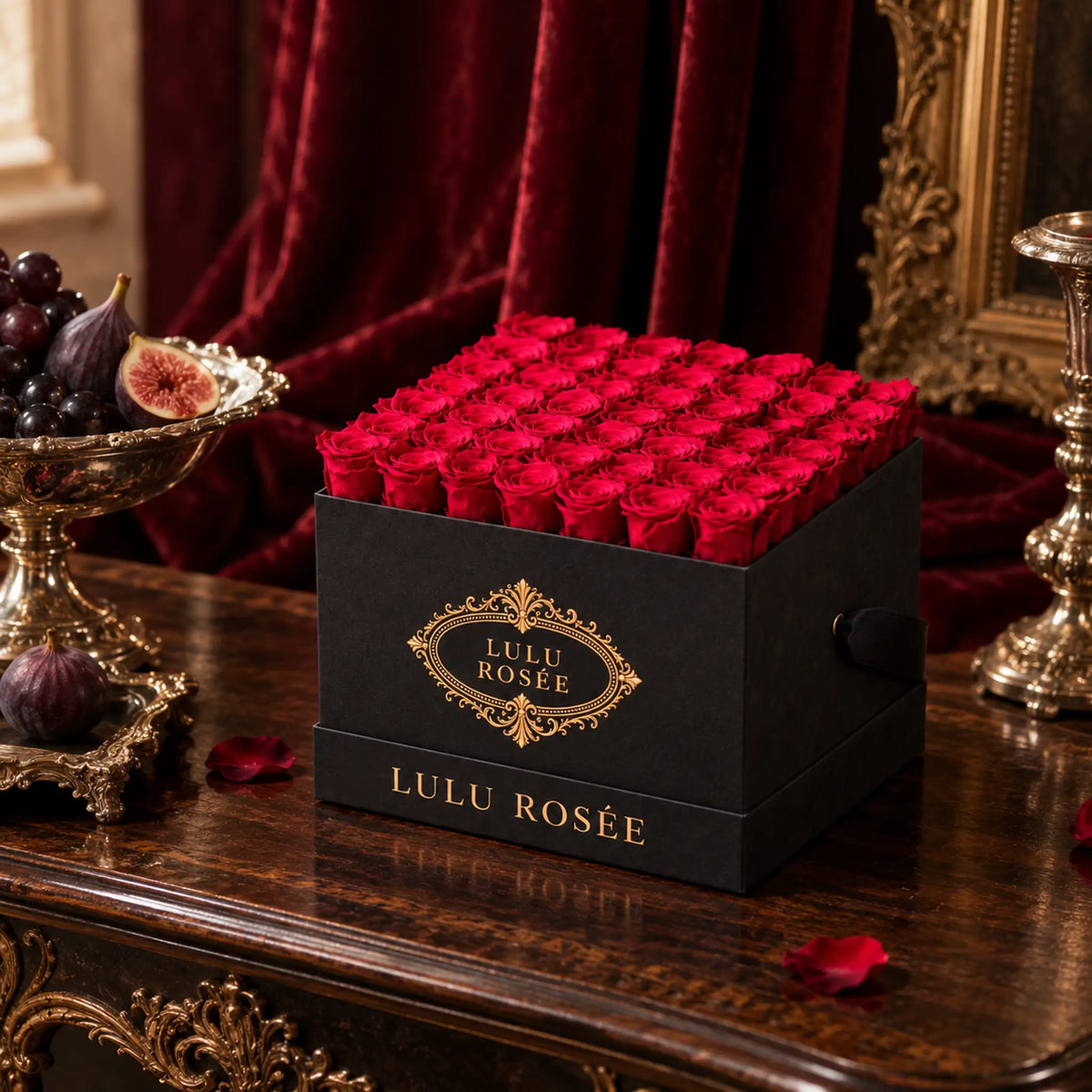 Red preserved roses in a Grey Suede LULU ROSÉE large square box styled in a velvet interior.