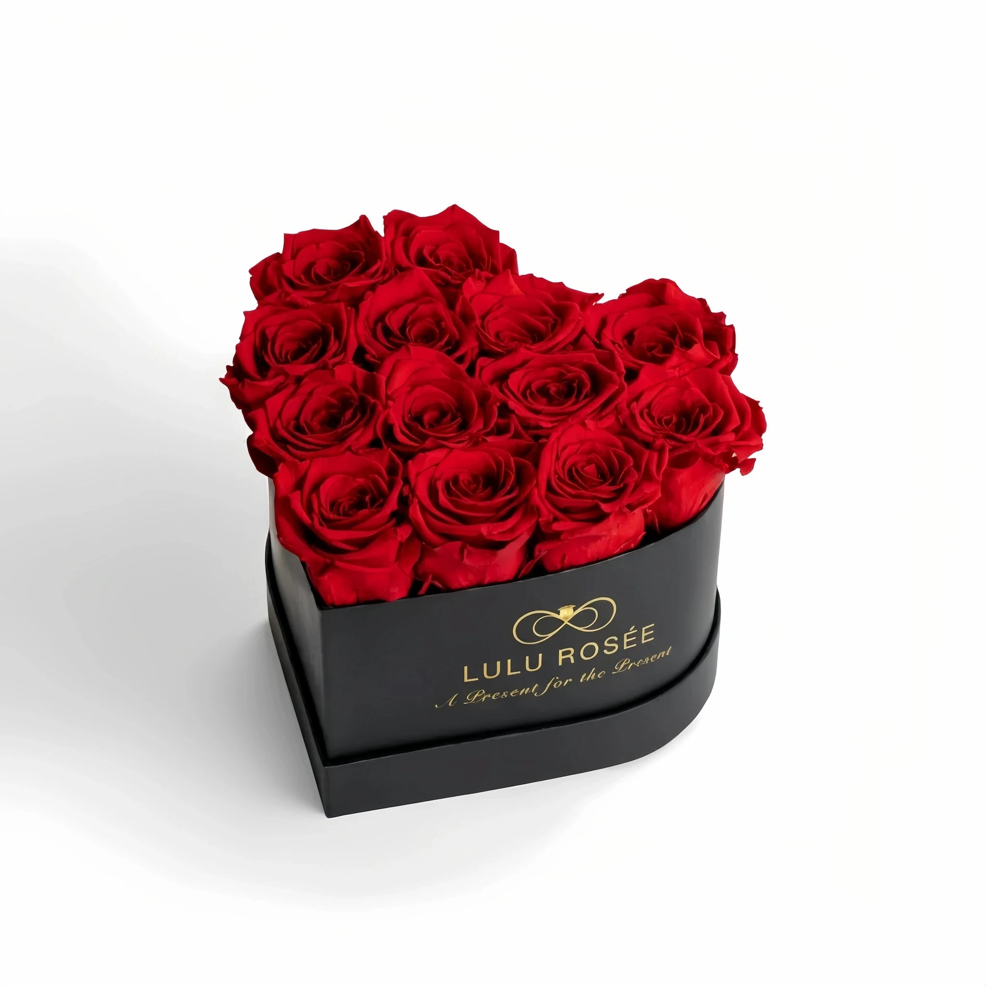 LULU ROSÉE medium heart box red roses black classic box on white background