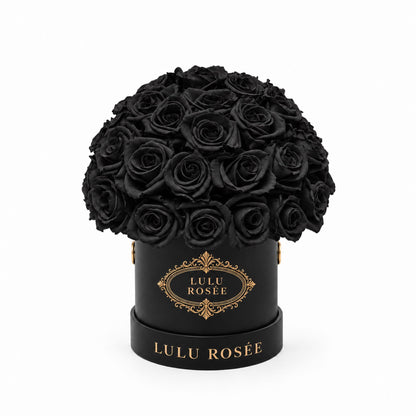 Black eternal roses in a black classic Mini Le Plein box on a white background.
