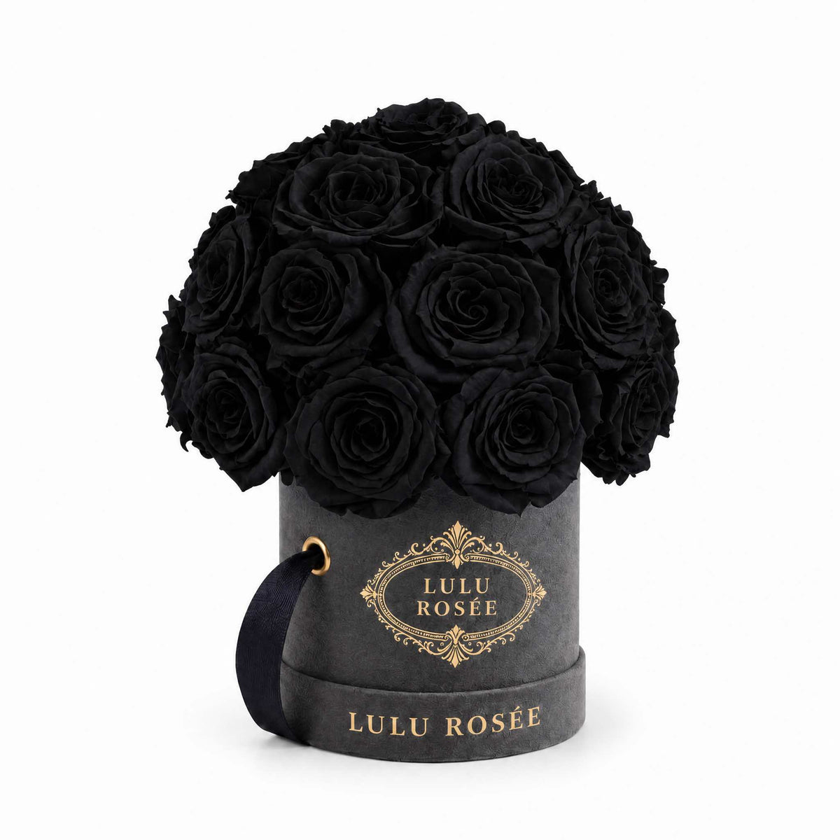 Black eternal roses in a grey suede Mini Le Plein box on a white background.