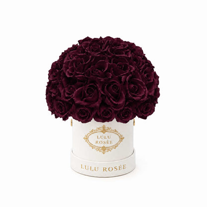 Burgundy eternal roses in a white classic Mini Le Plein box on a white background.