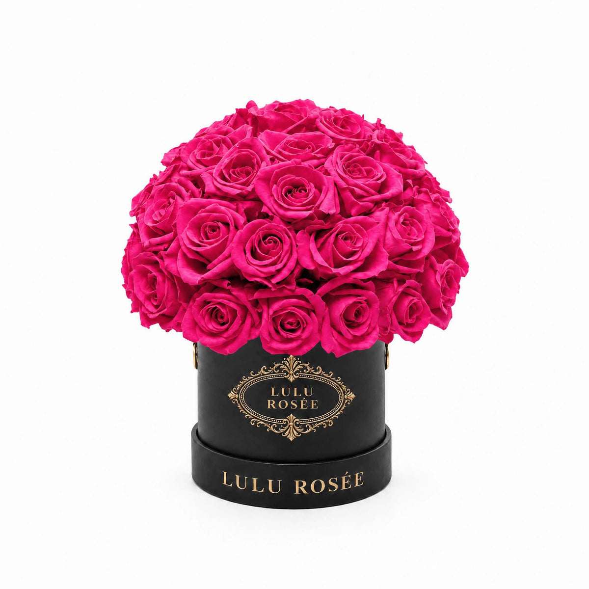 Rose pink eternal roses in a black classic Mini Le Plein box on a white background.