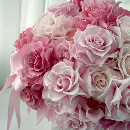 LULU ROSÉE Close-Up of Monochrome Pink Rose Garden Bucket, Preserved Pink Roses with Delicate Satin Ribbon Bow