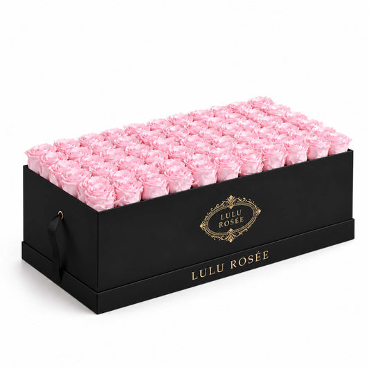 Light pink eternal roses in a Black Classic rectangular rose box