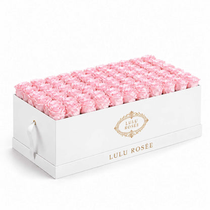 Light pink preserved roses in a White Classic rectangular flower box