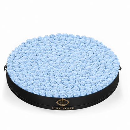 Baby blue preserved roses in a Black Classic Round Grandiose box