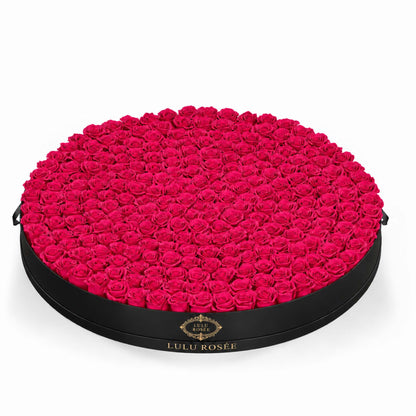 Rose pink preserved roses in a Black Classic Round Grandiose box
