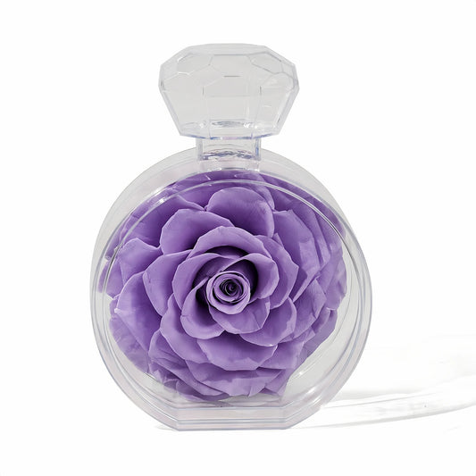 LULU ROSÉE single rose perfume bottle lavender rose on white background