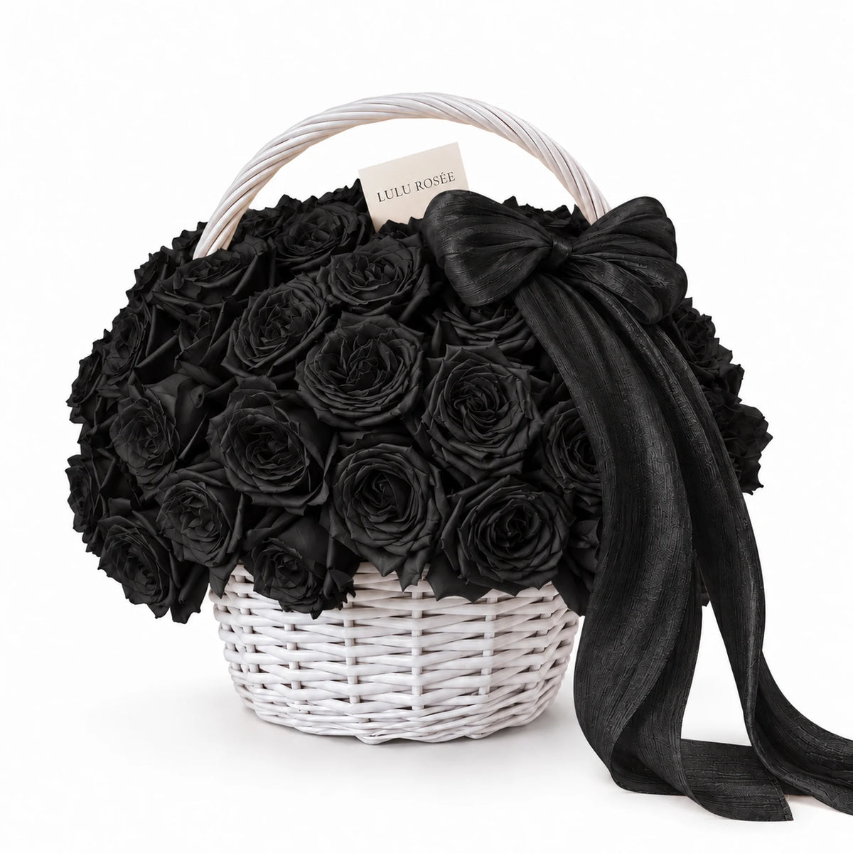 Black preserved rose basket with a black bow and white handle