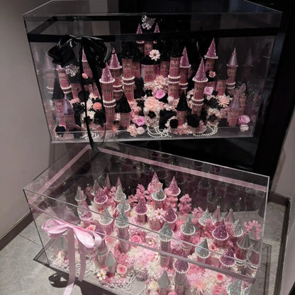 LULU ROSÉE pink and black-pink large preserved flower castles shown together