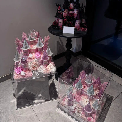 LULU ROSÉE pink and black-pink small preserved flower castles shown together