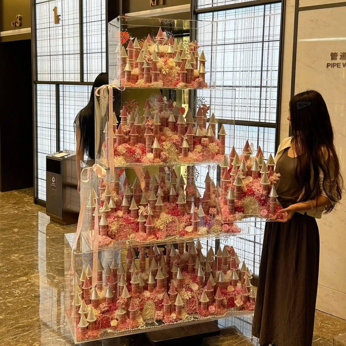 LULU ROSÉE pink preserved flower castle collection displayed in an interior setting