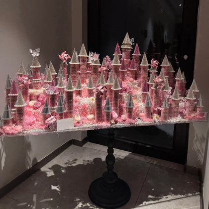LULU ROSÉE pink giant preserved flower castle shown from an angled view