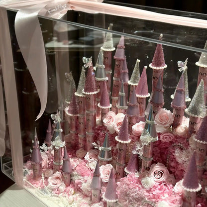 Close-up of the LULU ROSÉE pink giant preserved flower castle in a clear case