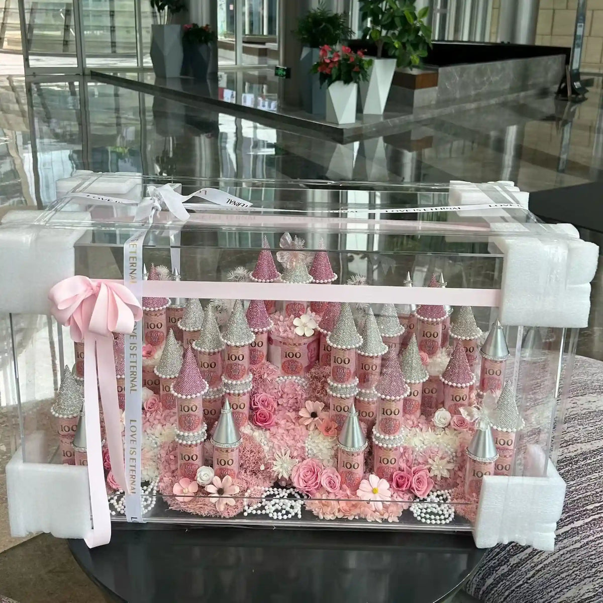 Close-up of the LULU ROSÉE pink large preserved flower castle arrangement