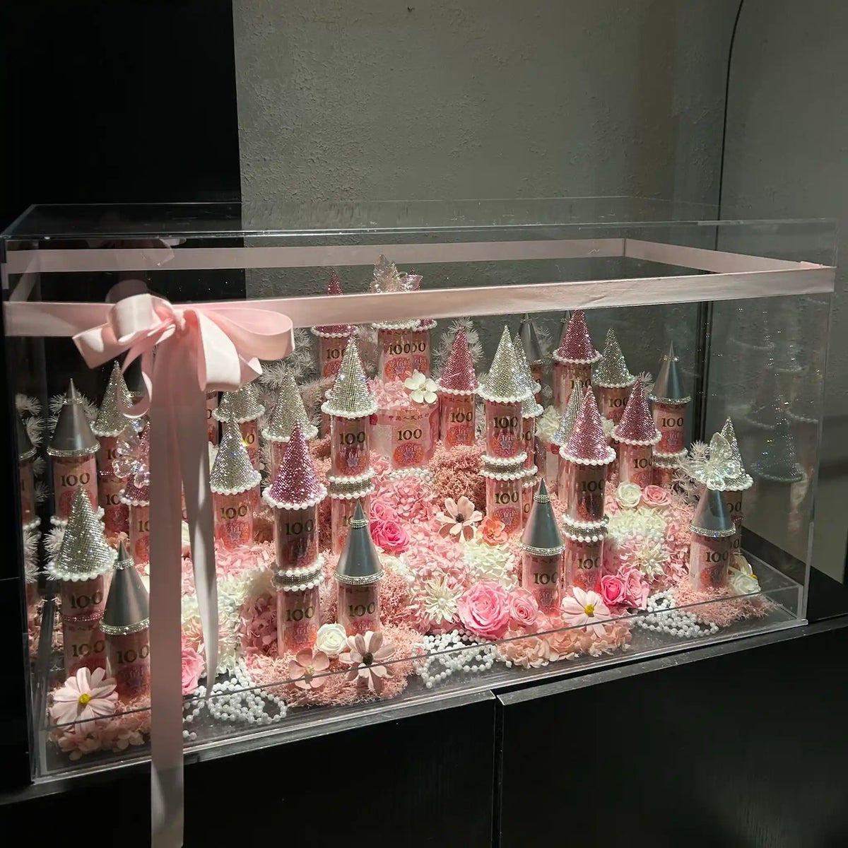 Front view of the LULU ROSÉE pink large preserved flower castle