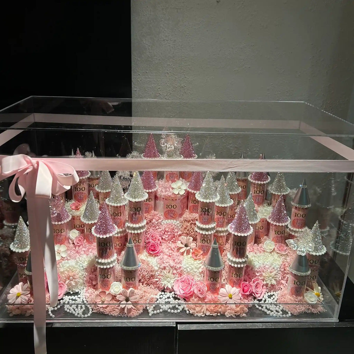 Wide view of the LULU ROSÉE pink large preserved flower castle display