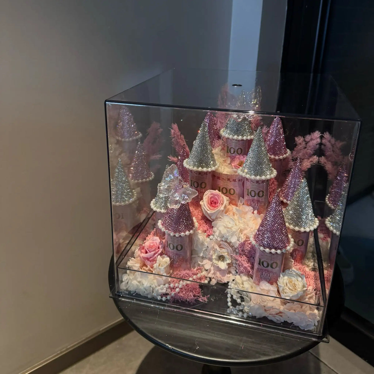 Close-up of the LULU ROSÉE pink small preserved flower castle arrangement
