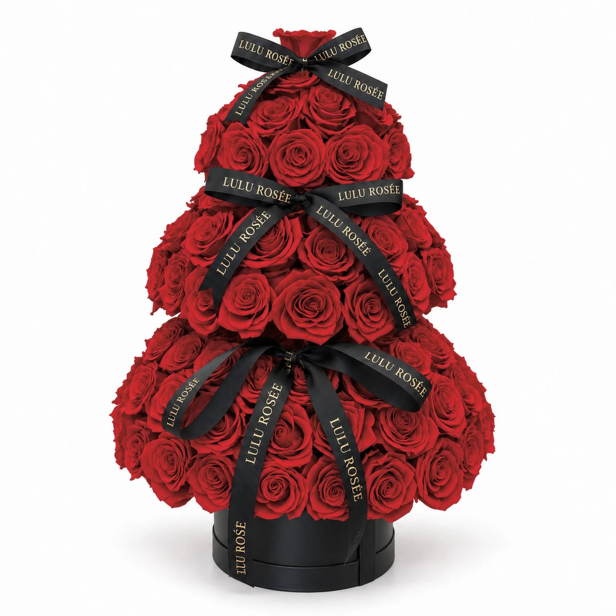 Red preserved rose Christmas tree with black LULU ROSÉE ribbons on a white background